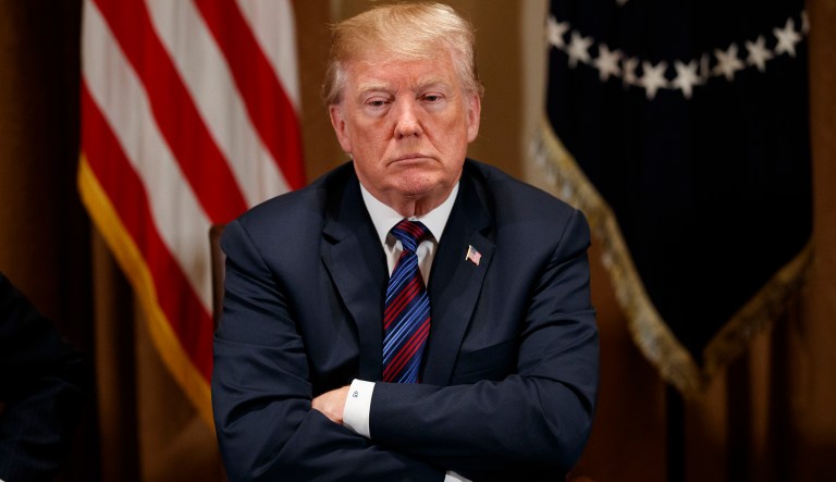President Trump listens during a meeting with governors and lawmakers in the Cabinet Room. (AP Photo/Evan Vucci)