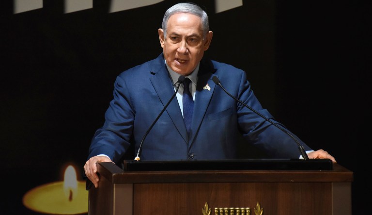 Israeli Prime Minister Benjamin Netanyahu speaks at the official ceremony for Israel's Memorial Day for fallen soldiers, at the National Memorial Hall for Israel's Fallen, in Mt. Herzl Military Cemetery, Jerusalem, Wednesday, April 18, 2018.