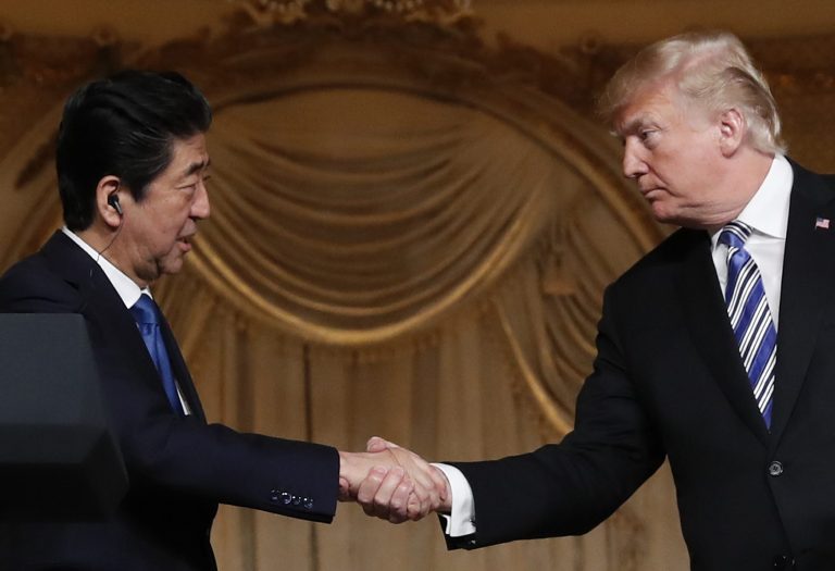 President Donald Trump and Japanese Prime Minister Shinzo Abe shake hands during a news conference at Trump's private Mar-a-Lago club, Wednesday, April 18, 2018, in Palm Beach, Fla.