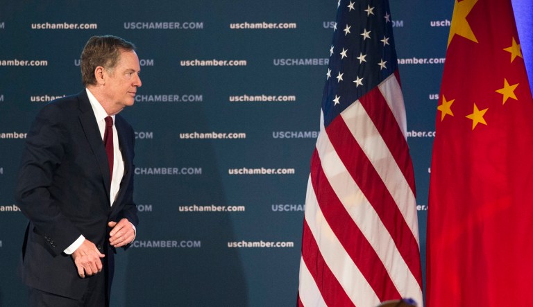 U.S. Trade Representative Robert Lighthizer leaves the stage after speaking at the 9th China Business Conference at the U.S. Chamber of Commerce in Washington, Tuesday, May 1, 2018. The U.S. Chamber of Commerce and AmCham China are hosting the event. The U.S. has threatened to impose tariffs on $150 billion of Chinese goods in retaliation for what it argues are Beijing's unfair trade practices and its requirement that U.S. companies turn over technology in exchange for access to its market. China has said it would subject $50 billion of U.S. goods to tariffs if the U.S. taxes its products. A delegation led by Treasury Secretary Steven Mnuchin,  Lighthizer and trade adviser Peter Navarro will visit Beijing for negotiations later this week. 
