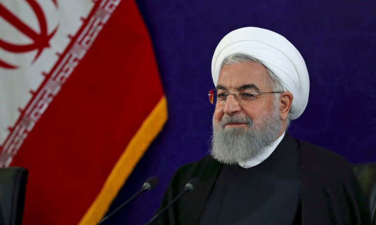 In this photo released by an official website of the office of the Iranian Presidency, President Hassan Rouhani attends a meeting with officials and industrialists, at a petroleum conference in Tehran, Iran, Tuesday, May 8, 2018. Iran's president on Tuesday warned the country could face "some problems" ahead of President Donald Trump's decision on whether to pull out of its nuclear deal with world powers. 