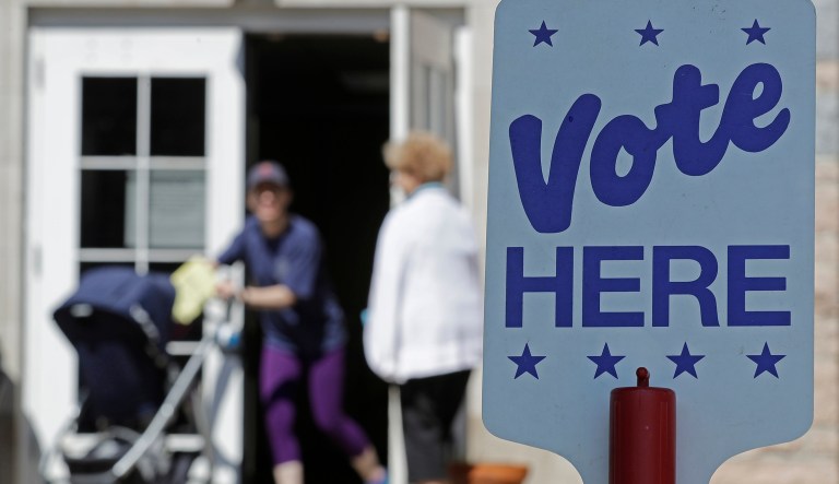 Voters leave a polling place in Charlotte, N.C.
