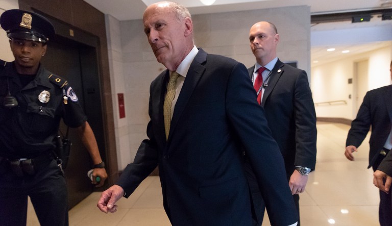 Director of National Intelligence Dan Coats arrives as House and Senate lawmakers from both parties gather for a classified briefing in a secure room about the federal investigation into President Donald Trump's 2016 campaign, on Capitol Hill in Washington, Thursday, May 24, 2018. Trump is calling his newest attempt at discrediting special counsel Robert Mueller's Russia investigation "spygate" amid reports that a longtime government informant approached members of his campaign during the 2016 presidential election in a possible bid to glean intelligence on Russian efforts to sway the election.