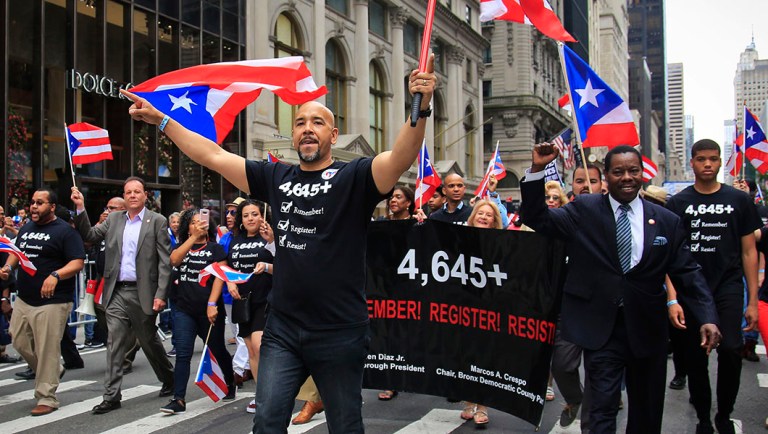 Bronx Borough President Ruben Diaz, center, leads a group of state and city officials during the Puerto Rican Day Parade.