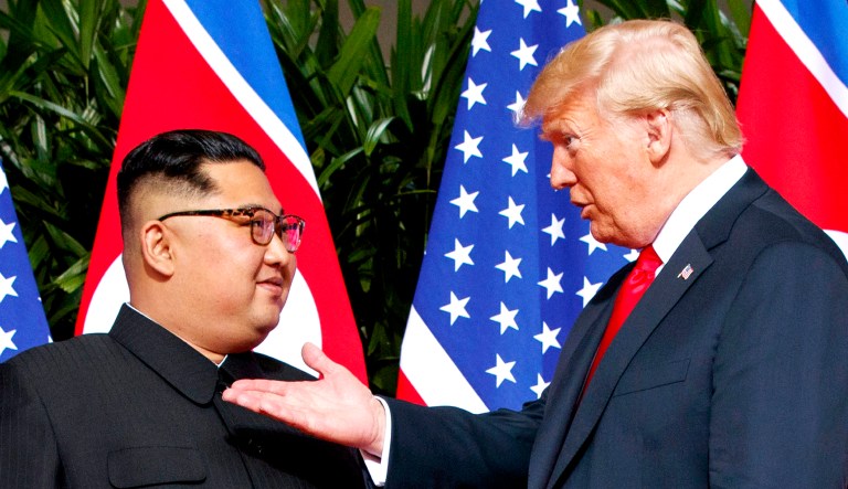 President Donald Trump, right, meets with North Korean leader Kim Jong Un on Sentosa Island in Singapore. (AP Photo/Evan Vucci)