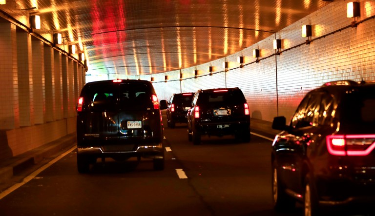President Trump's motorcade drives through a tunnel.