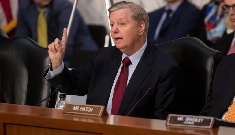 Sen. Lindsey Graham, R-S.C., question Justice Department Inspector General Michael Horowitz and FBI Director Christopher Wray on the internal report of the FBI's Clinton email probe and the role of former FBI Director James Comey's actions during the 2016 presidential campaign, on Capitol Hill in Washington, Monday, June 18, 2018. 