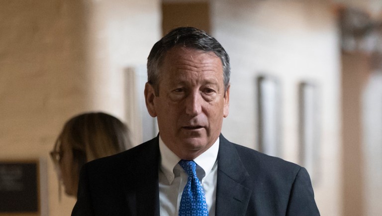 Rep. Mark Sanford, R-S.C., walks to a closed-door conference with fellow Republicans after they met last night with President Donald Trump to discuss a GOP immigration bill, at the Capitol in Washington, Wednesday, June 20, 2018. (AP Photo/J. Scott Applewhite)