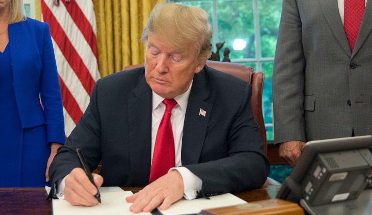 President Trump sits in the Oval Office of the White House in Washington on June 20, 2018.