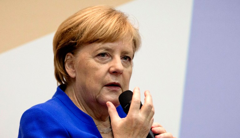 German Chancellor Angela Merkel answers a question during a meeting with students at the campus of the German Jordanian University, in the city of Madaba, Jordan, on Thursday.