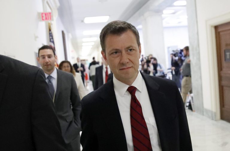 Peter Strzok walks to a hearing on Capitol Hill in Washington, D.C.