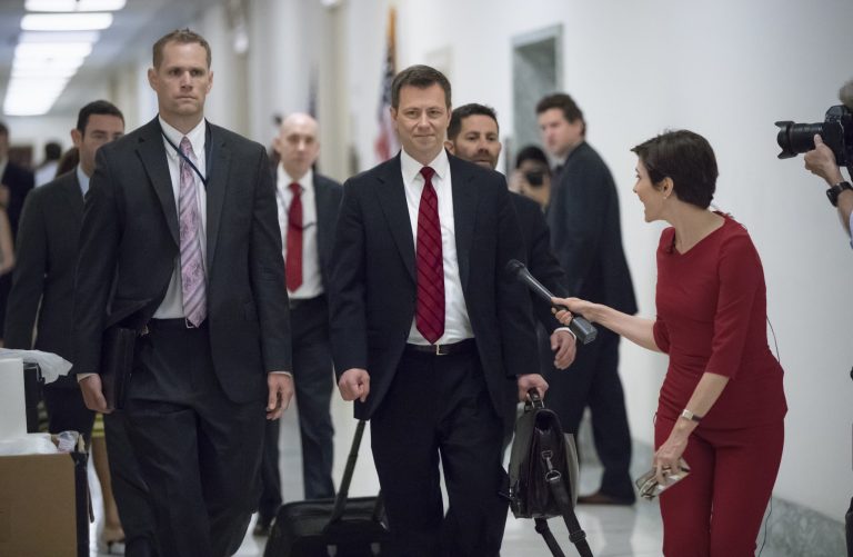 Peter Strzok walks to a hearing on Capitol Hill in Washington, D.C.