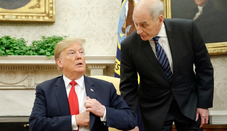 White House chief of staff John Kelly, right, leans in to talk with President Donald Trump during Trump's meeting with Portuguese President Marcelo Rebelo de Sousa in the Oval Office of the White House in Washington, Wednesday, June 27, 2018.