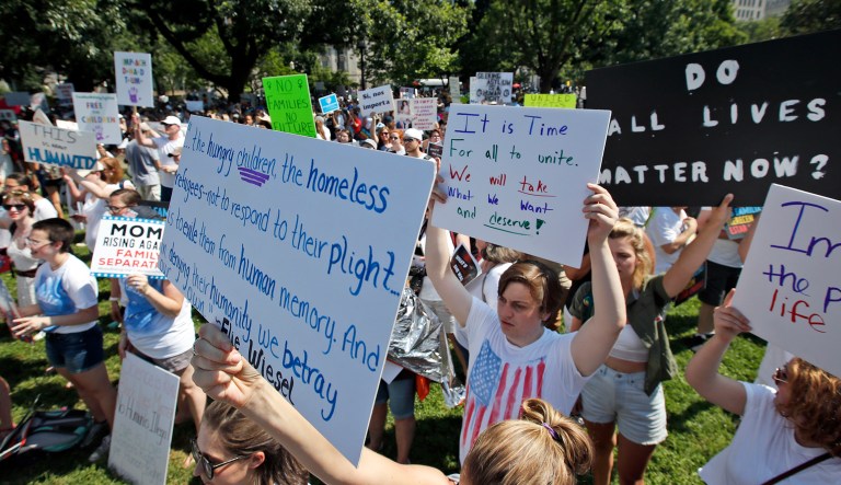 Activists gather to protest the Trump administration's approach to illegal border crossings and separation of children from immigrant parents in Lafayette Square across from the White House on Saturday in Washington.