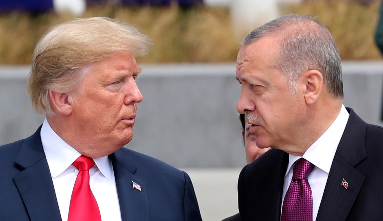 President Trump (pictured left) talks to Turkish President Recep Tayyip Erdogan (pictured right).