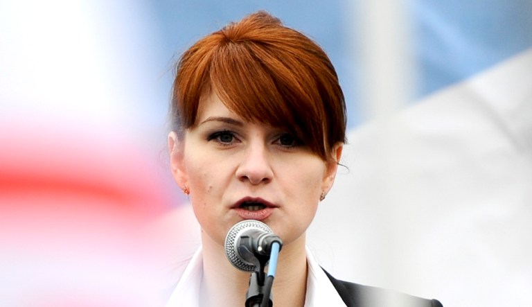 In this photo taken on April 21, 2013, Maria Butina, leader of a pro-gun organization in Russia, speaks to a crowd during a rally in support of legalizing the possession of handguns in Moscow, Russia. Butina, a 29-year-old gun-rights activist, served as a covert Russian agent while living in Washington, gathering intelligence on American officials and political organizations and working to establish back-channel lines of communications for the Kremlin, federal prosecutors charged Monday, July 16, 2018.