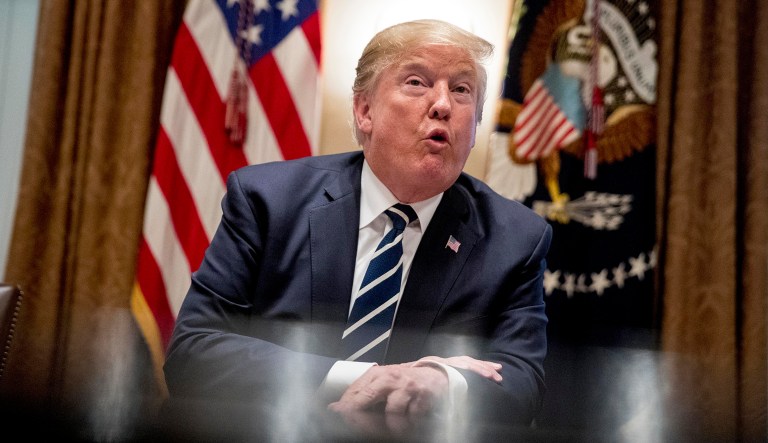 President Trump speaks to members of the media as he meets with members of Congress in the Cabinet Room of the White House on Tuesday in Washington.