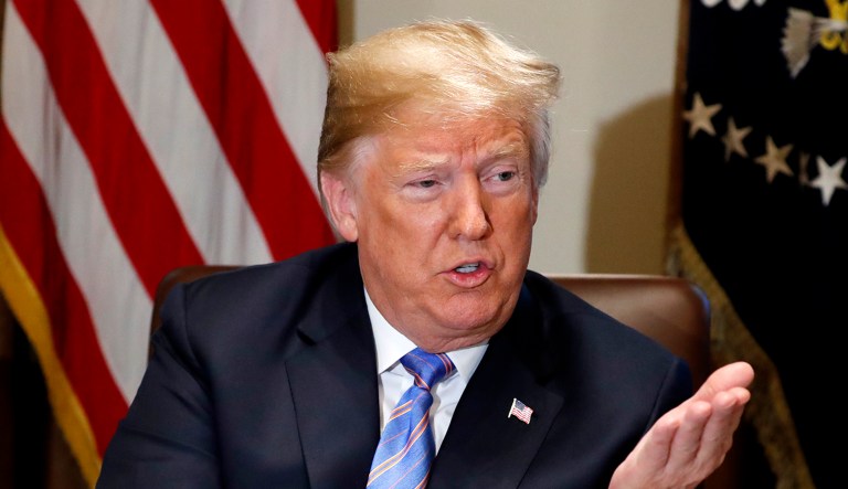 President Trump speaks during his meeting with members of his cabinet in Cabinet Room of the White House in Washington.