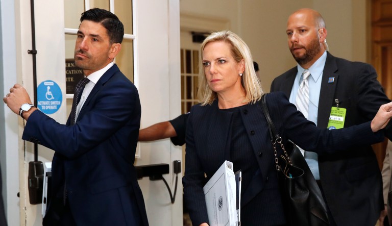 Homeland Security Secretary Kirstjen Nielsen, center, arrives for a closed-door meeting on Capitol Hill in Washington.