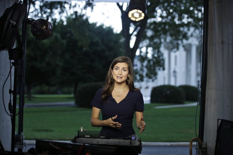 CNN White House correspondent Kaitlan Collins talks during a live shot in front of the White House on July 25, 2018, in Washington.