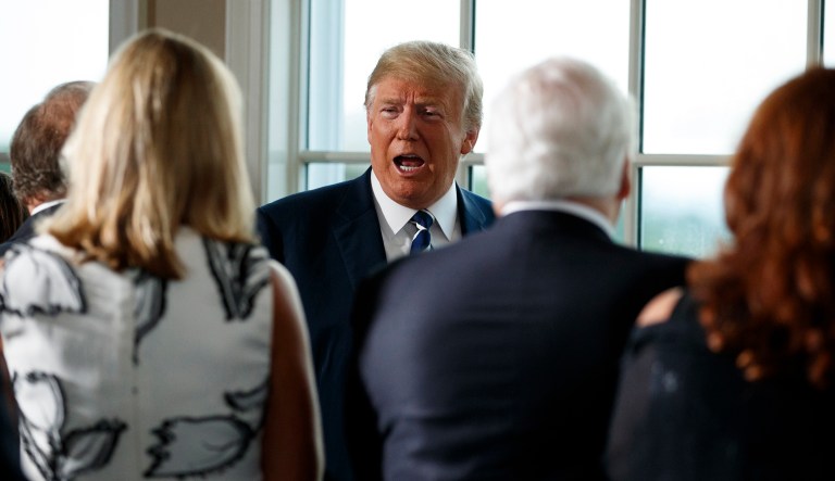 President Trump arrives for a dinner with business leaders on Aug. 7, 2018, at Trump National Golf Club in Bedminster, N.J.