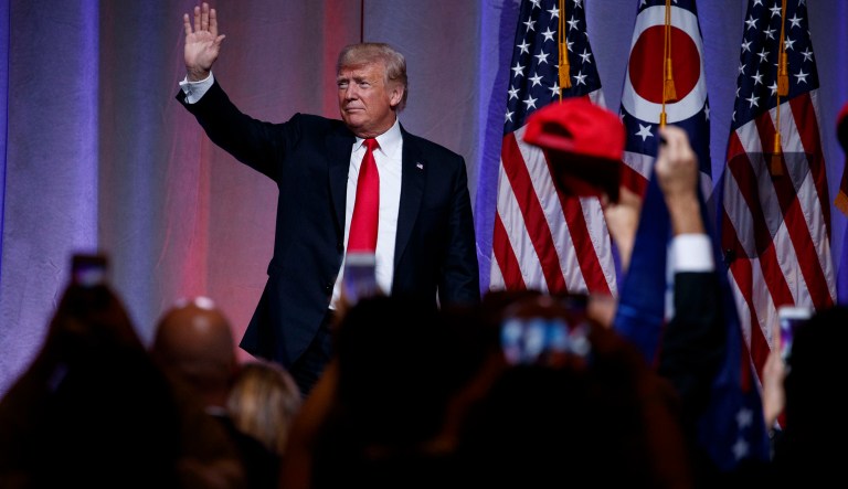 President Donald Trump waves after speaking to the Ohio Republican Party State Dinner, Friday, Aug. 24, 2018, in Columbus, Ohio. 