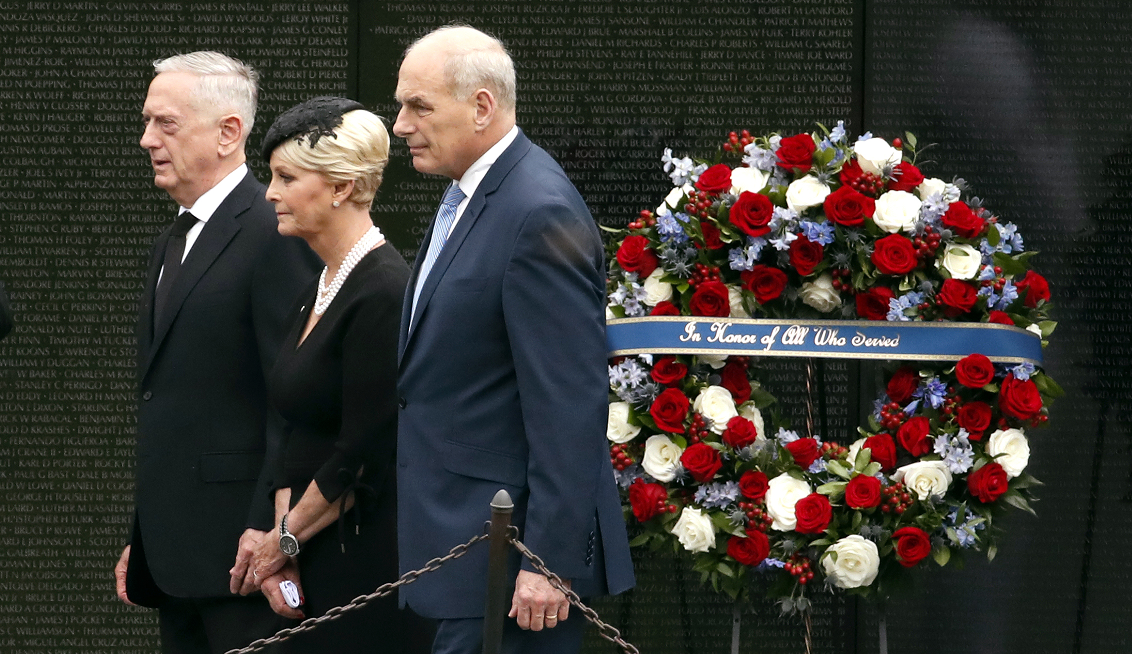 Cindy McCain, the wife of Sen. John McCain, R-Ariz., with Defense Secretary Jim Mattis, left, and White House Chief of Staff John Kelly, depart after placing a wreath at the Vietnam Veterans Memorial, Saturday, Sept. 1, 2018, in Washington. 