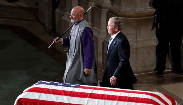 Former President George W. Bush walks away after speaking at a memorial service for Sen. John McCain, R-Ariz., at Washington National Cathedral in Washington, Saturday, Sept. 1, 2018.