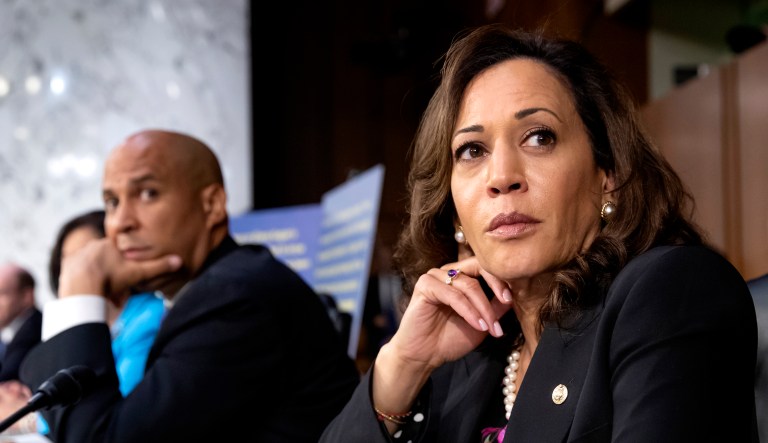 Sen. Kamala Harris, D-Calif., and Sen. Cory Booker, D-N.J., left, appear at a hearing on Capitol Hill in D.C.