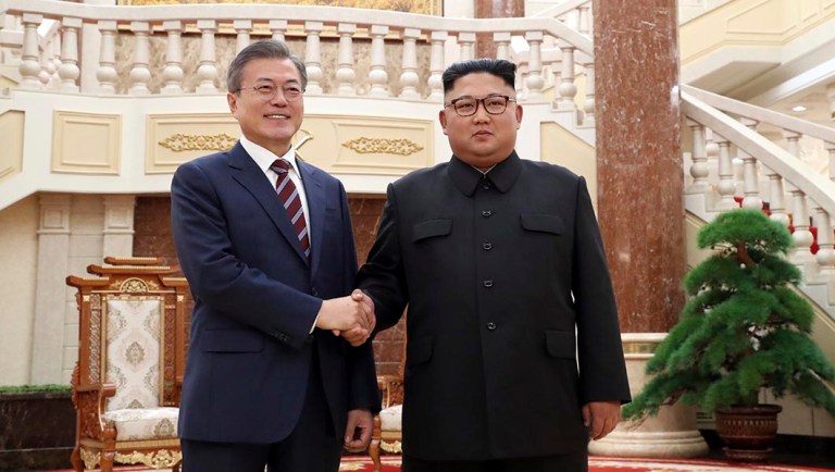 North Korean leader Kim Jong Un, right, shakes hands with South Korean President Moon Jae-in before their summit at the headquarters of the Central Committee of the Workers' Party in Pyongyang, North Korea.