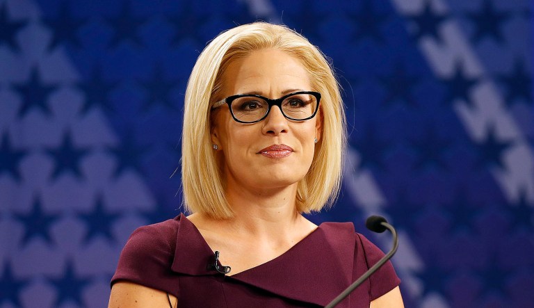 U.S. Rep. Kyrsten Sinema, D-Ariz., goes over the rules in a television studio prior to a televised debate with U.S. Rep. Martha McSally, R-Ariz., Monday, Oct. 15, 2018, in Phoenix. Both ladies are seeking to fill the seat of U.S. Sen. Jake Flake, R-Ariz. who is retiring. The Arizona Senate contest is one of the most closely-watched in the nation.
