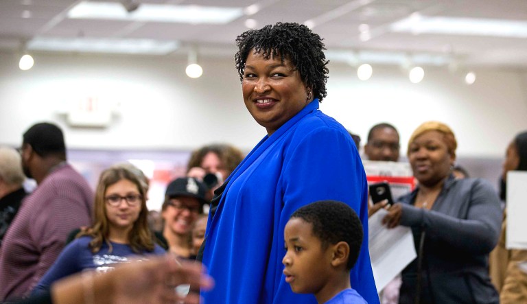 Georgia gubernatorial candidate Stacey Abrams prepares to vote during early voting at The Gallery at South DeKalb Mall in Decatur on Oct. 22, 2018.