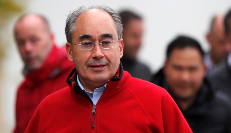 U.S. Rep. Bruce Poliquin, R-Maine, walks ahead of employees of the ND Paper mill during a campaign stop in Old Town, Maine.