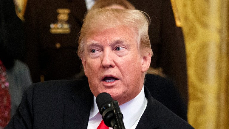 President Trump speaks in the East Room of the White House.