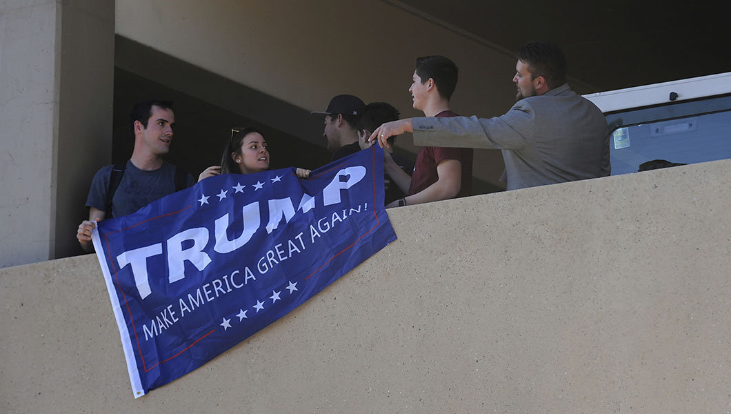 Trump supporters with ‘MAGA’ banner removed from rally after Bernie Sanders calls them out