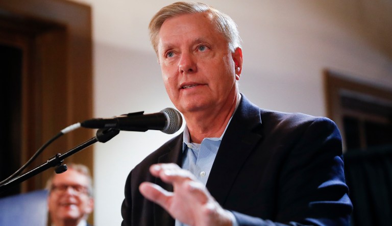Sen. Lindsey Graham, R-S.C., speaks during a campaign event for Ohio Attorney General and Republican gubernatorial candidate Mike DeWine, left, Tuesday, Oct. 30, 2018, in downtown Cincinnati.