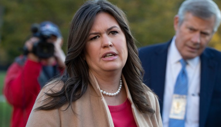 White House Press Secretary Sarah Sanders responds to reporters asking about President Donald Trump possibly signing an executive order to revoke the Fourteenth Amendment's right to citizenship for babies born to non-U.S. citizens on American soil, outside the White House West Wing in Washington, Wednesday, Oct. 31, 2018. 