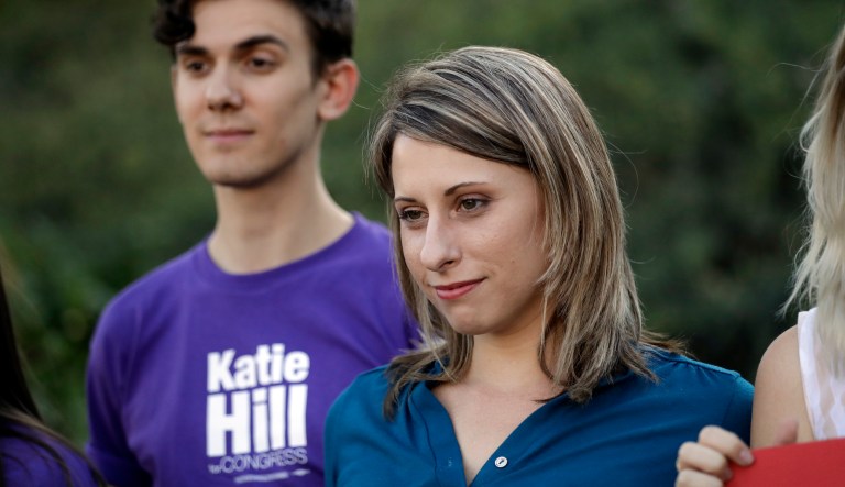 Katie Hill, a Democratic party candidate from California's 25th congressional district, right, poses for campaign photos Monday, Nov. 5, 2018, in Stevenson Ranch, Calif. 