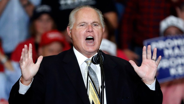 Radio personality Rush Limbaugh speaks at a the start of a campaign rally.
