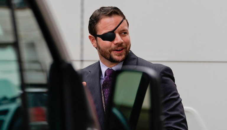 Rep.-elect Dan Crenshaw, R-Texas, leaves after attending orientation for new members of Congress, Tuesday, Nov. 13, 2018, in Washington.