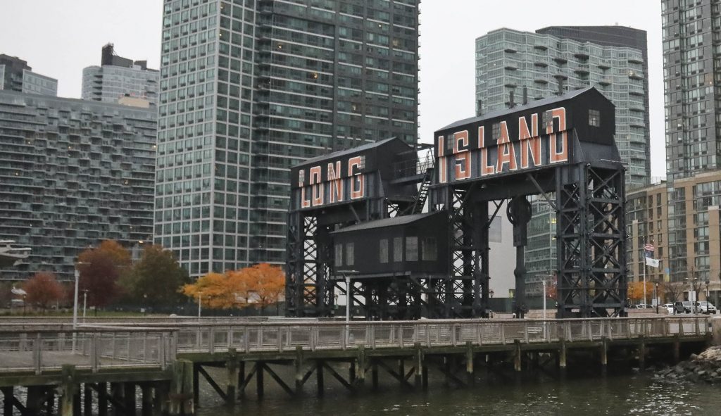 A former dock facility is shown with old transfer bridges, with "Long Island" painted in large letters at Gantry State Park in the Long Island City section of Queens, N.Y.