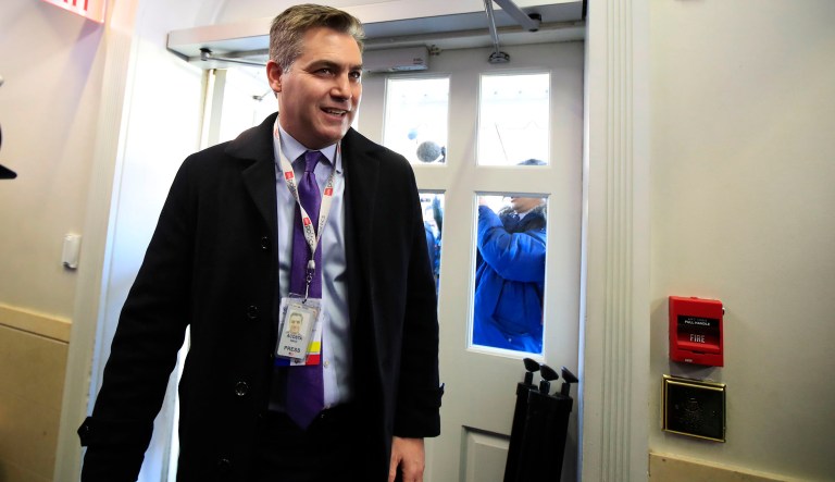 CNN's Jim Acosta enters the Brady press briefing room upon returning back to the White House in Washington, Friday, Nov. 16, 2018. U.S. District Court Judge Timothy Kelly ordered the White House to immediately return Acostaâs credentials. He found that Acosta was âirreparably harmedâ and dismissed the governmentâs argument that CNN could send another reporter in Acostaâs place to cover the White House.