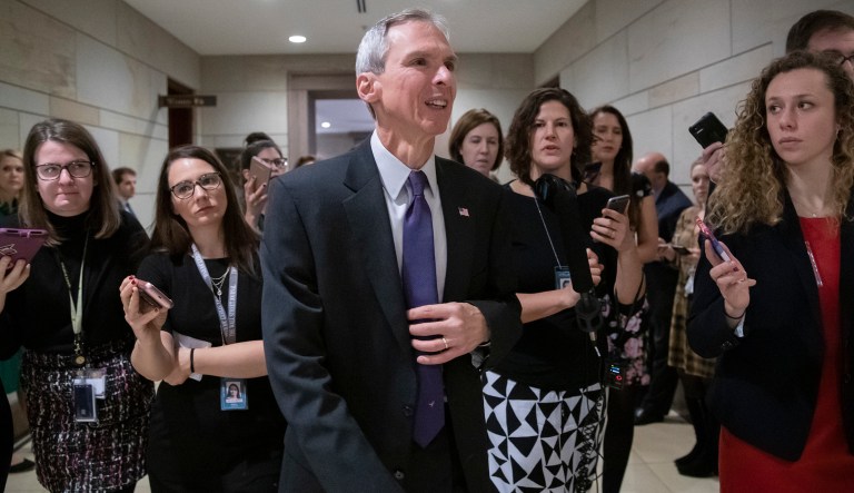 Rep. Dan Lipinski, D-Ill., is met by reporters as he leaves the Democratic Caucus leadership elections at the Capitol in Washington, Wednesday, Nov. 28, 2018.
