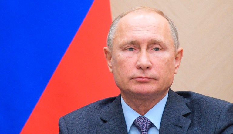 Russian President Vladimir Putin chairs a Security Council meeting in the Kremlin in Moscow, Russia, on Thursday.