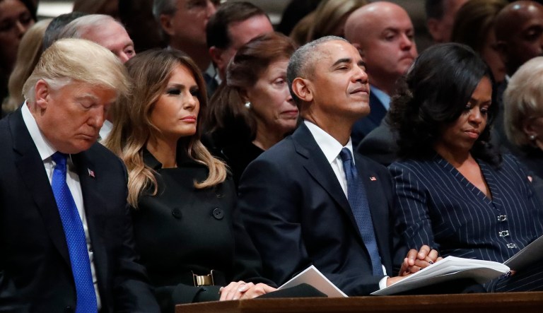 From left, President Donald Trump, first lady Melania Trump, former President Barack Obama, and Michelle Obama listen during a State Funeral at the National Cathedral, Wednesday, Dec. 5, 2018, in Washington, for former President George H.W. Bush.
