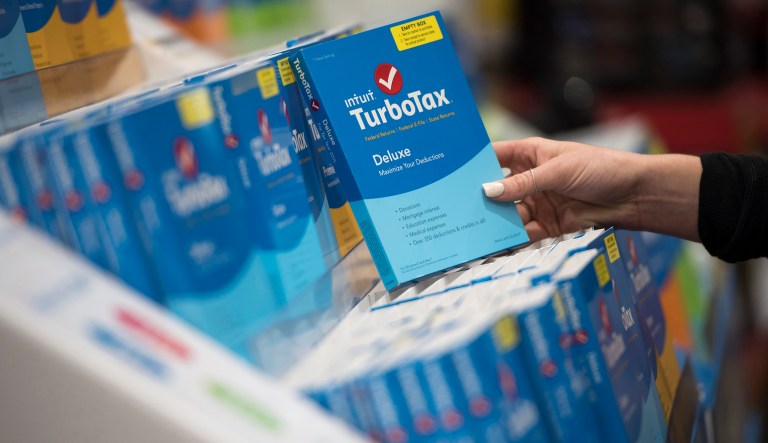 FILE - In this April 18, 2016 file photo a person looks at Intuit TurboTax software on display at a retailer in Foster City, Calif. Filing Minnesota state income tax returns for 2018 is going to be more of a pain than usual. That's because lawmakers and the governor left a crucial piece of legislation unfinished, and it's too late to fix it for the upcoming tax season. innesota Revenue Commissioner Cynthia Bauerly said her department encourages electronic filing, whether it's through tax preparers, commercial tax software such as TurboTax, or with free software available via her department's website.