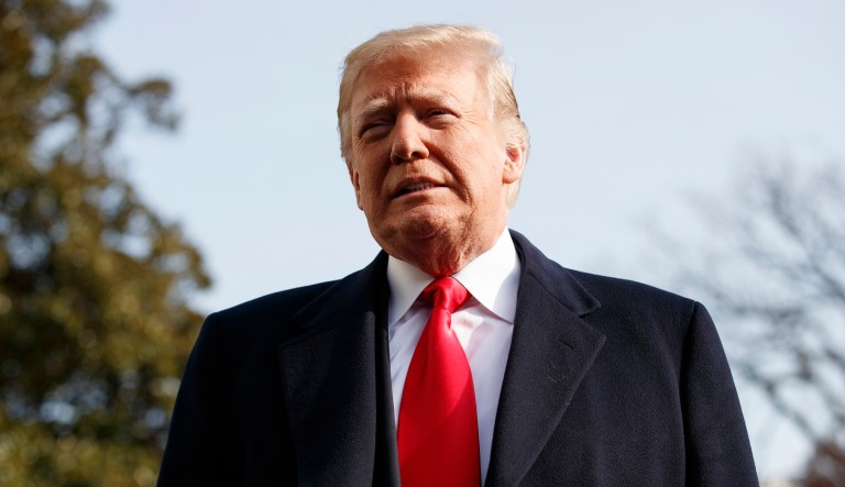 President Trump pauses as he talks to media before boarding Marine One on the South Lawn of the White House in Washington, Saturday, Dec. 8, 2018, for the short trip to Andrews Air Force Base en route to Philadelphia to attend the Army-Navy Football Game. 