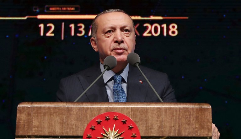 Turkey's President Recep Tayyip Erdogan delivers a speech during a defence industry meeting event in Ankara, Turkey, Wednesday, Dec. 12, 2018. Erdogan said Turkey will begin "within a few days" a new military operation to drive out U.S-backed Syrian Kurdish fighters in Syria, east of the Euphrates River. The move is likely to increase tensions between NATO allies, Turkey, and the United States.