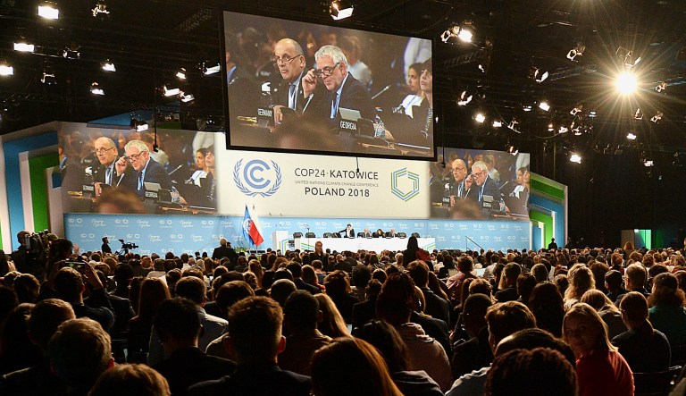 Participants attend the COP24 U.N. Climate Change Conference 2018 in Katowice, Poland, Thursday, Dec. 13, 2018. 