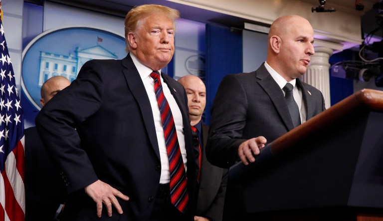 President Trump, left, listens as Brandon Judd, president of the National Border Patrol Council, talks about border security, Thursday Jan. 3, 2019, after making a surprise visit to the press briefing room of the White House in Washington.